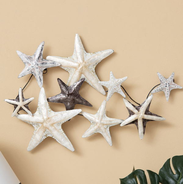 Aksesori Kapal dan Bintang Laut di Dinding